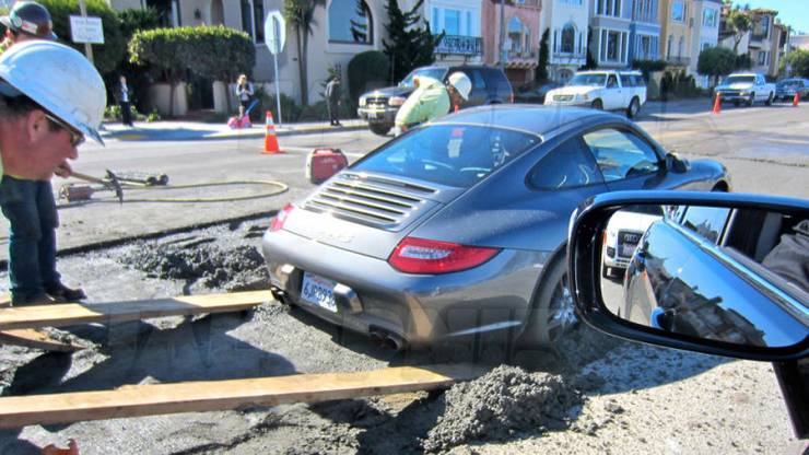Resultado de imagem para he pulled into had just been laid with fresh cement, and his Porsche 911 got stuck