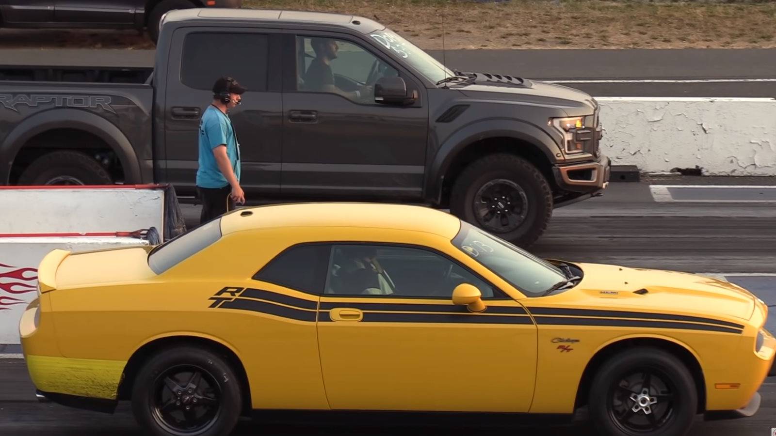 Watch A Raptor Take On A Challenger, Mustang, And Ram 3500 In Drag Race