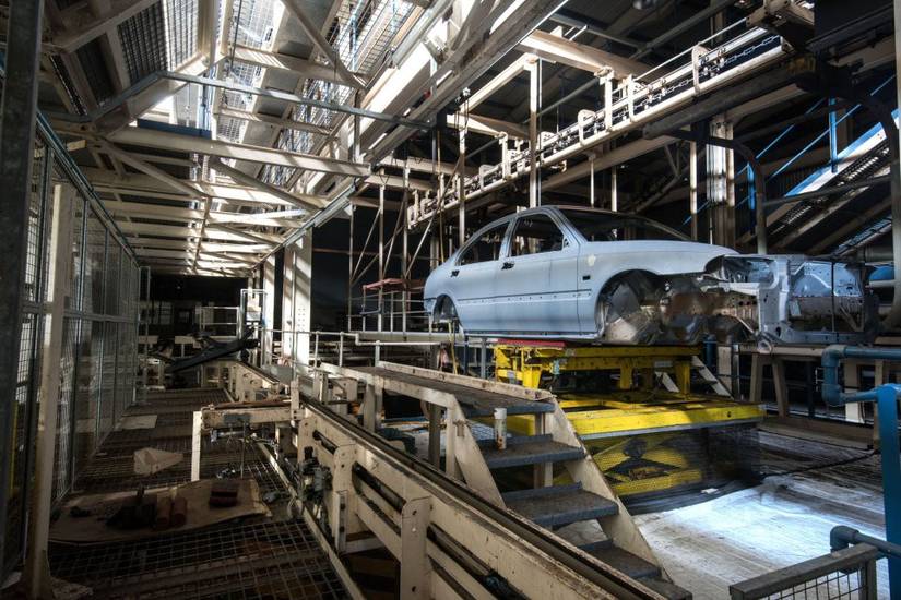 20 Sad Photos Of Cars In Factories That Were Left Behind