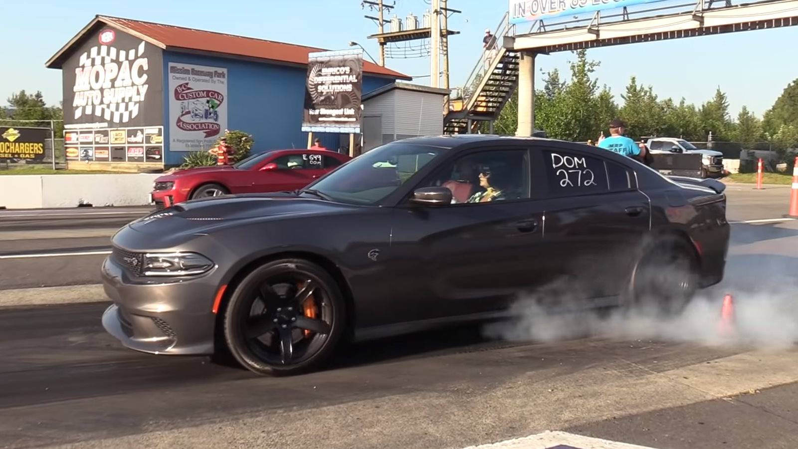 Dodge Charger Hellcat Takes On Chevy Camaro ZL1 In Quarter-Mile Action