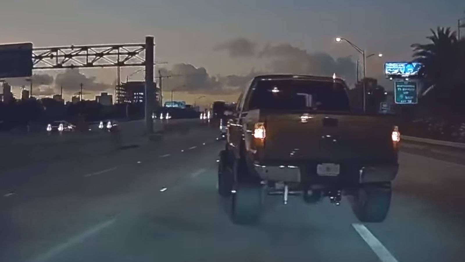 Watch Tesla Model 3 Get "Coal Rolled" By Angry Diesel Pickup