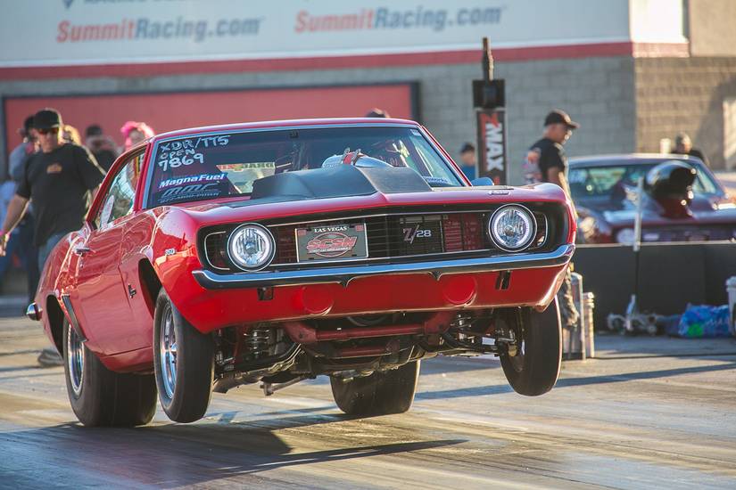 15 Beast Photos Of Muscle Cars With Oversized Engines