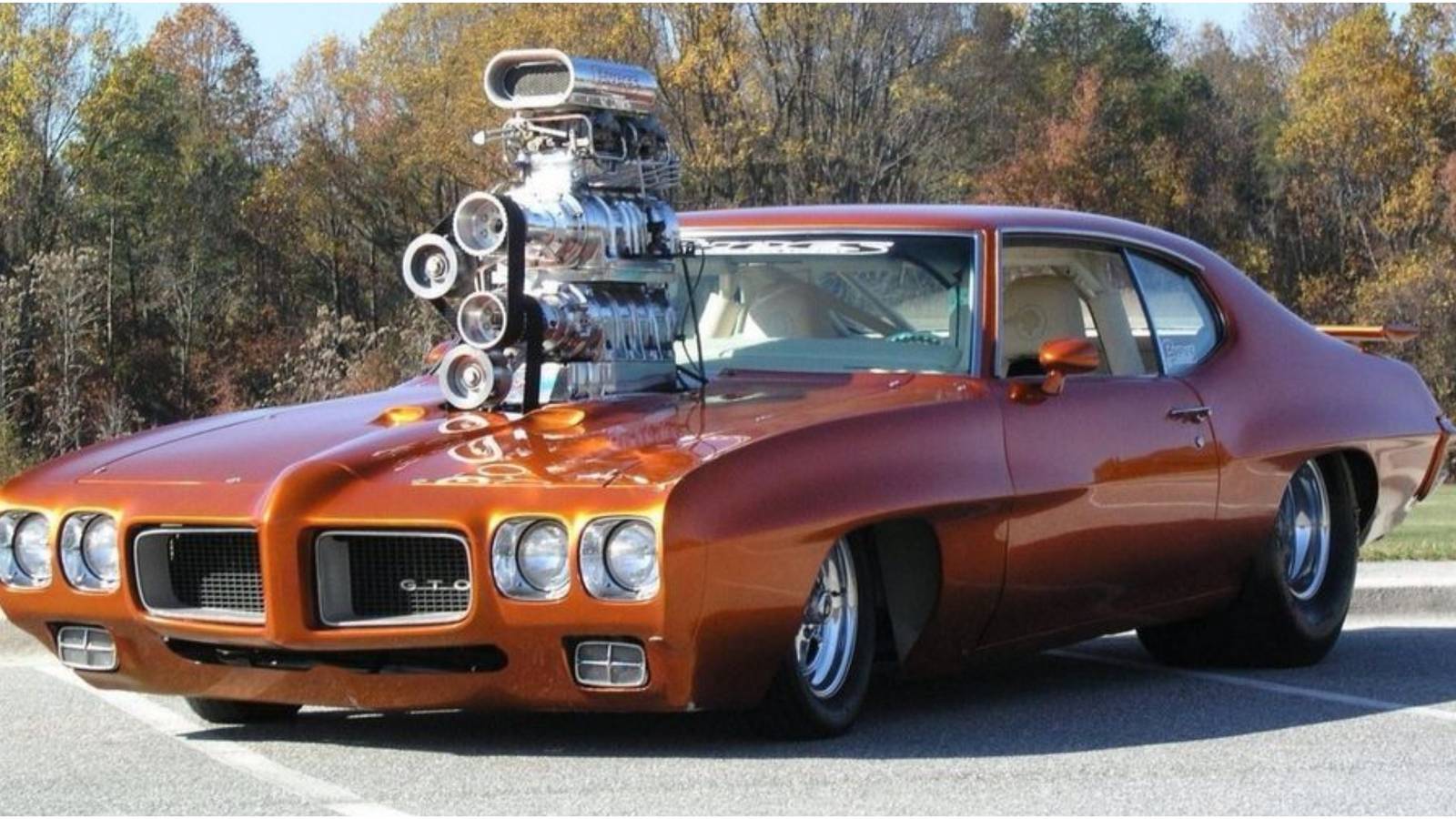 15 Beast Photos Of Muscle Cars With Oversized Engines