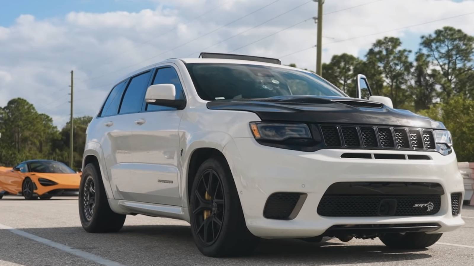 Watch This 1400-HP Twin-Turbo Trackhawk Tear Up The Drag Strip