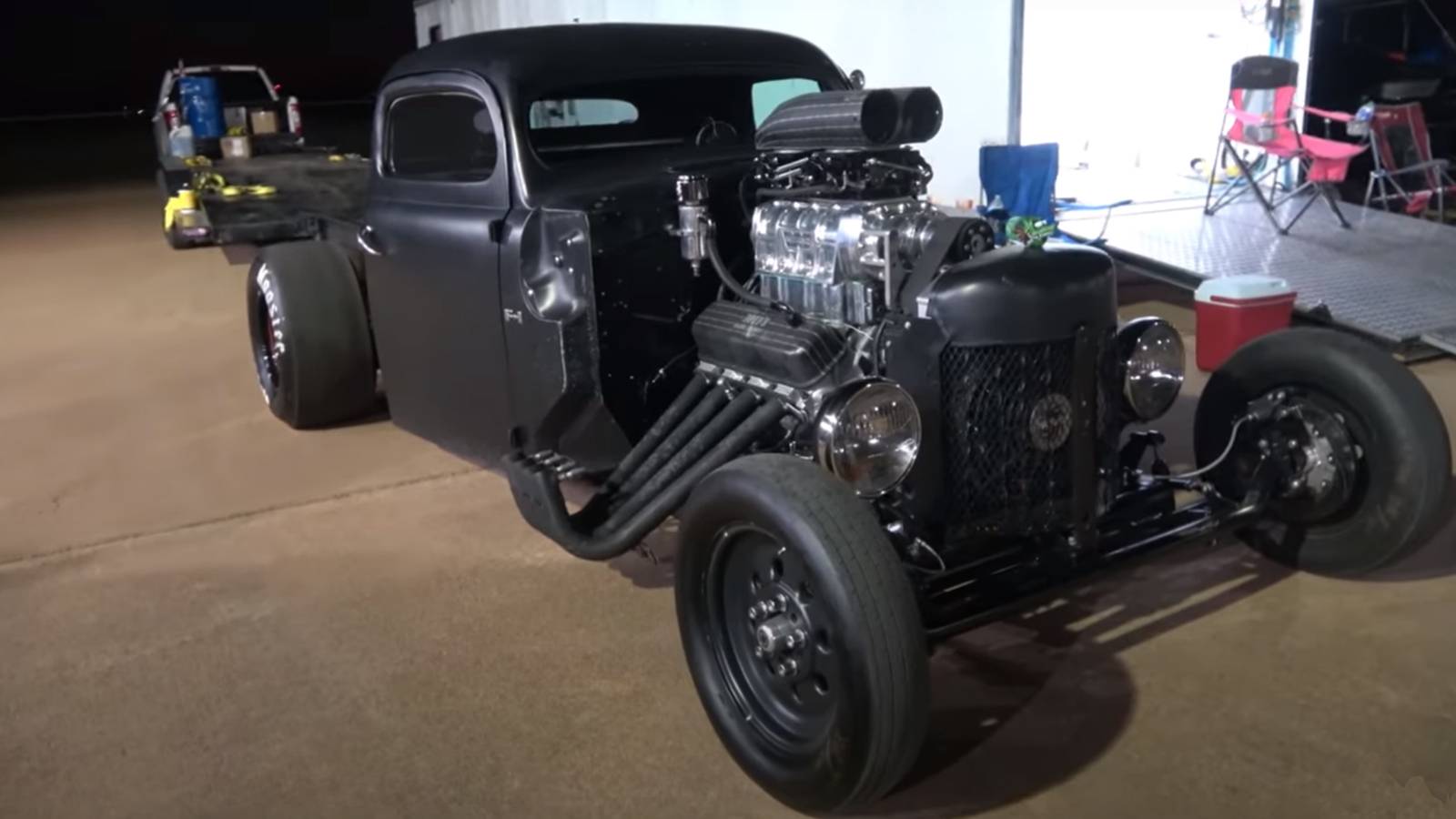 Watch This Blown Rat Rod Drag Race A Nitrous Camaro
