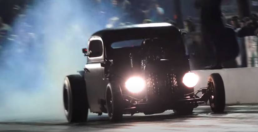 Watch This Blown Rat Rod Drag Race A Nitrous Camaro