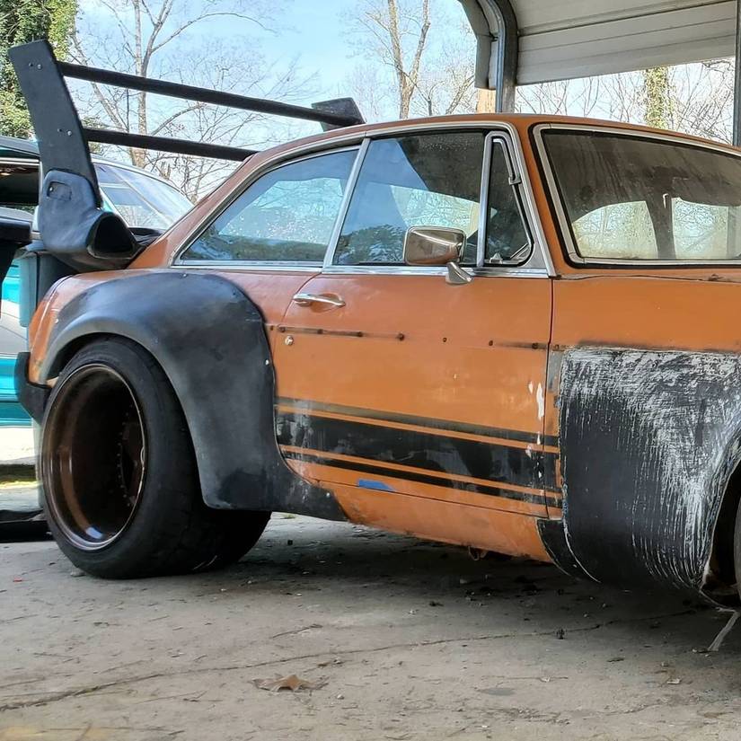 Watch This Guy Build An RWB Style MGB GT In His Garage
