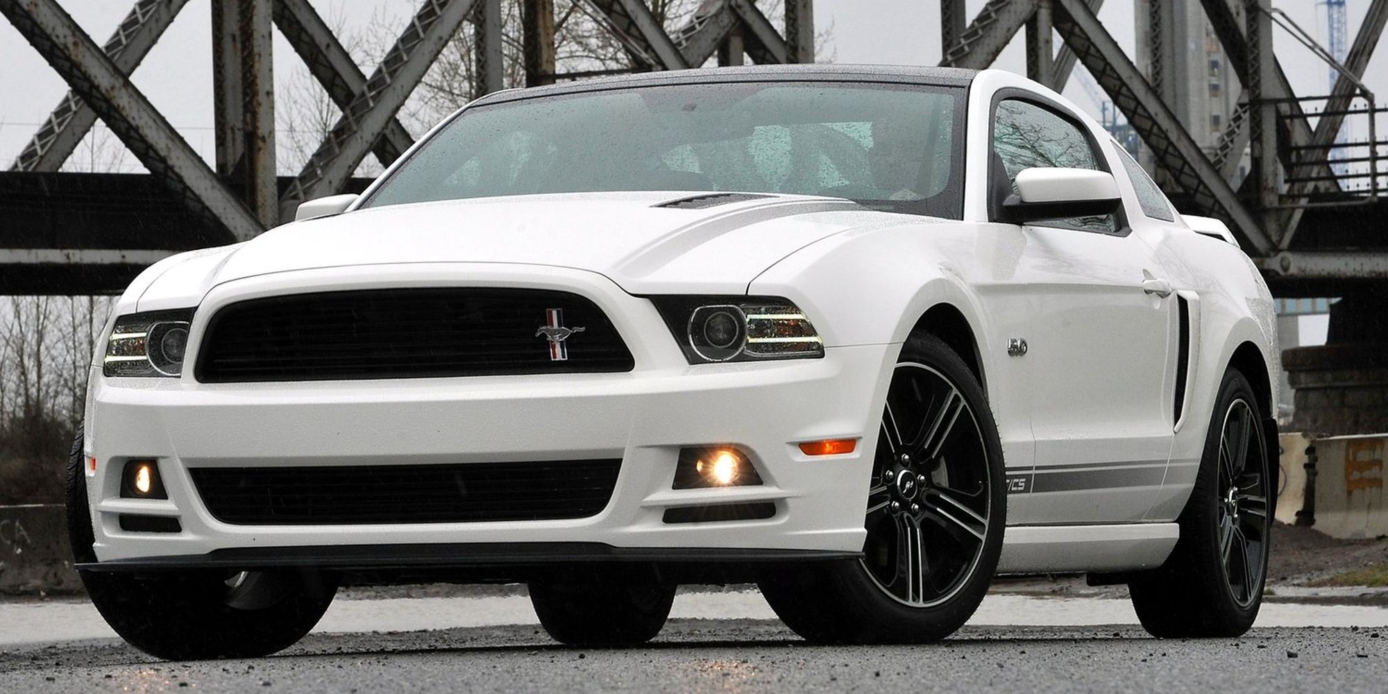 The front of a white S-197-II Mustang