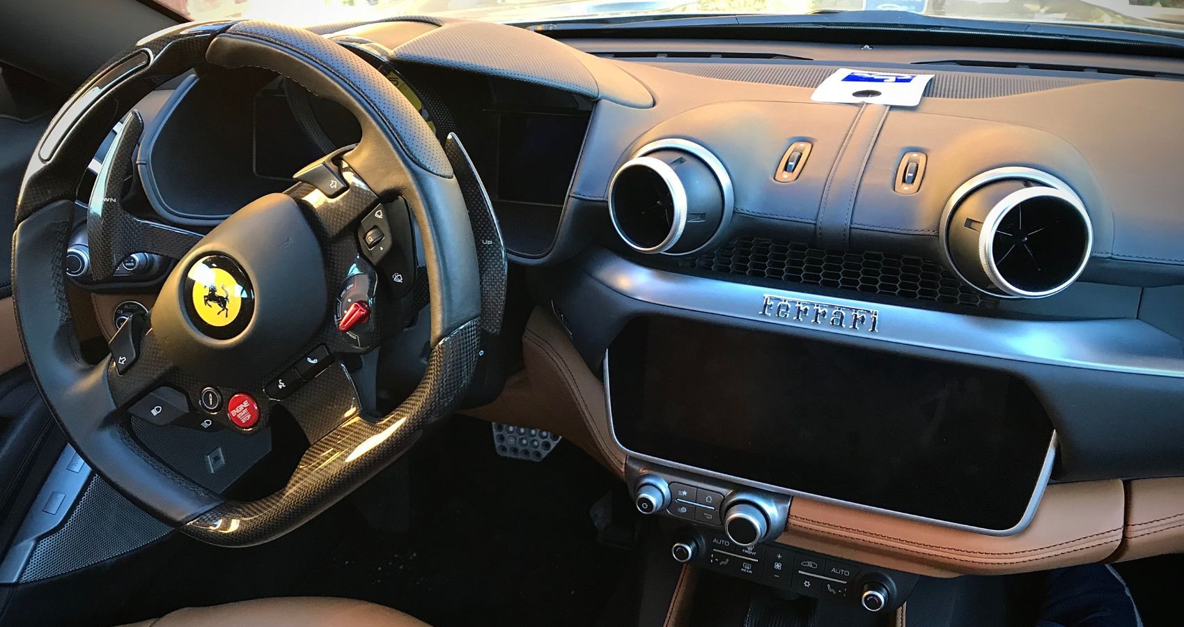 2020 Ferrari Portofino steering wheel and infotainment display 