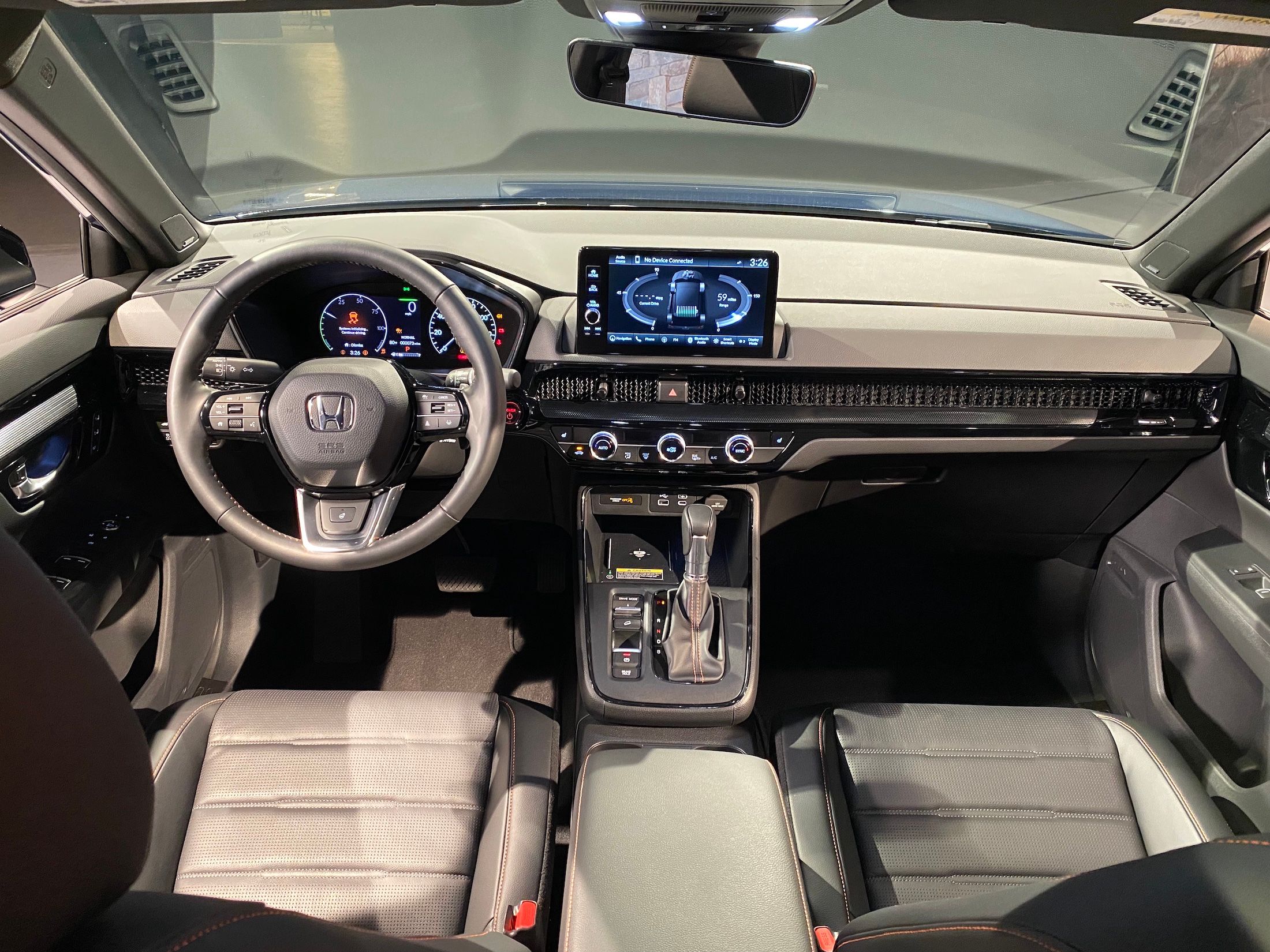2023 Honda CR-V Sport Touring dash and front seats