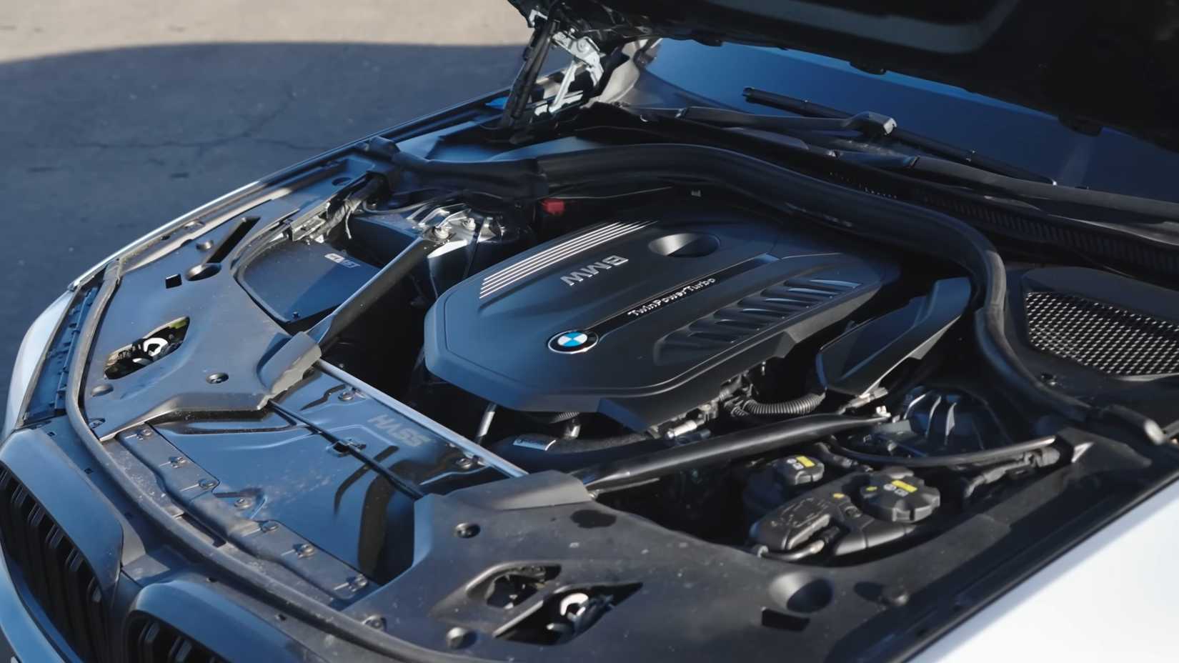 A silver 2020 BMW 540i xdrive engine bay B58