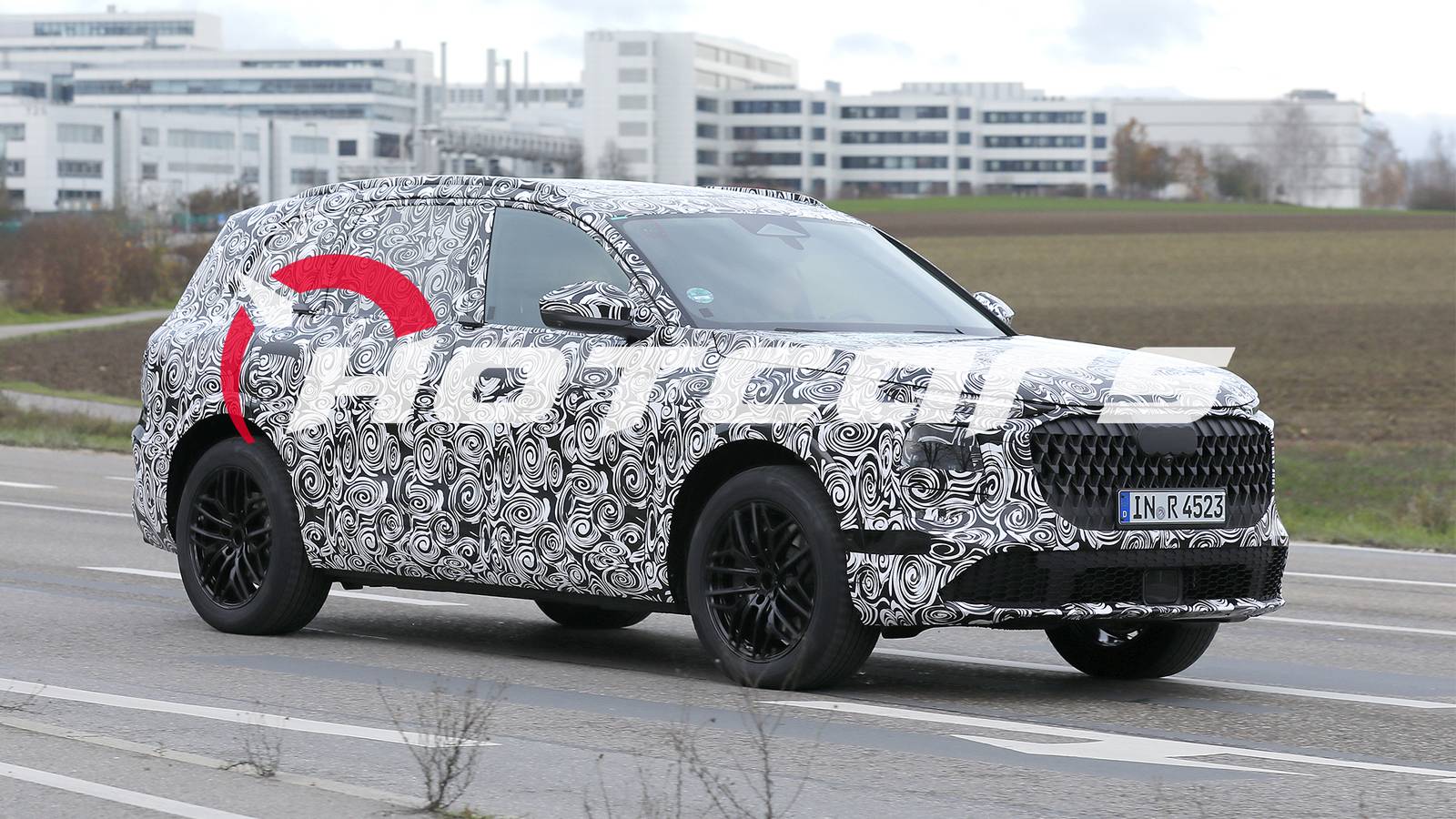 A Camouflage Q7 Test Mule Confirms Audi's Upcoming SUV Refresh
