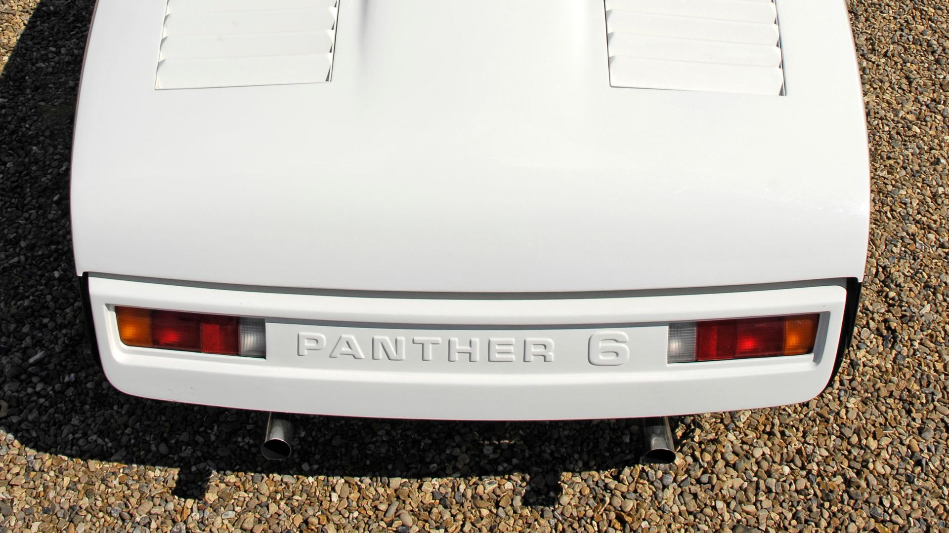 This Forgotten Supercar Had 6 Wheels And Cadillac's Biggest V8 Ever