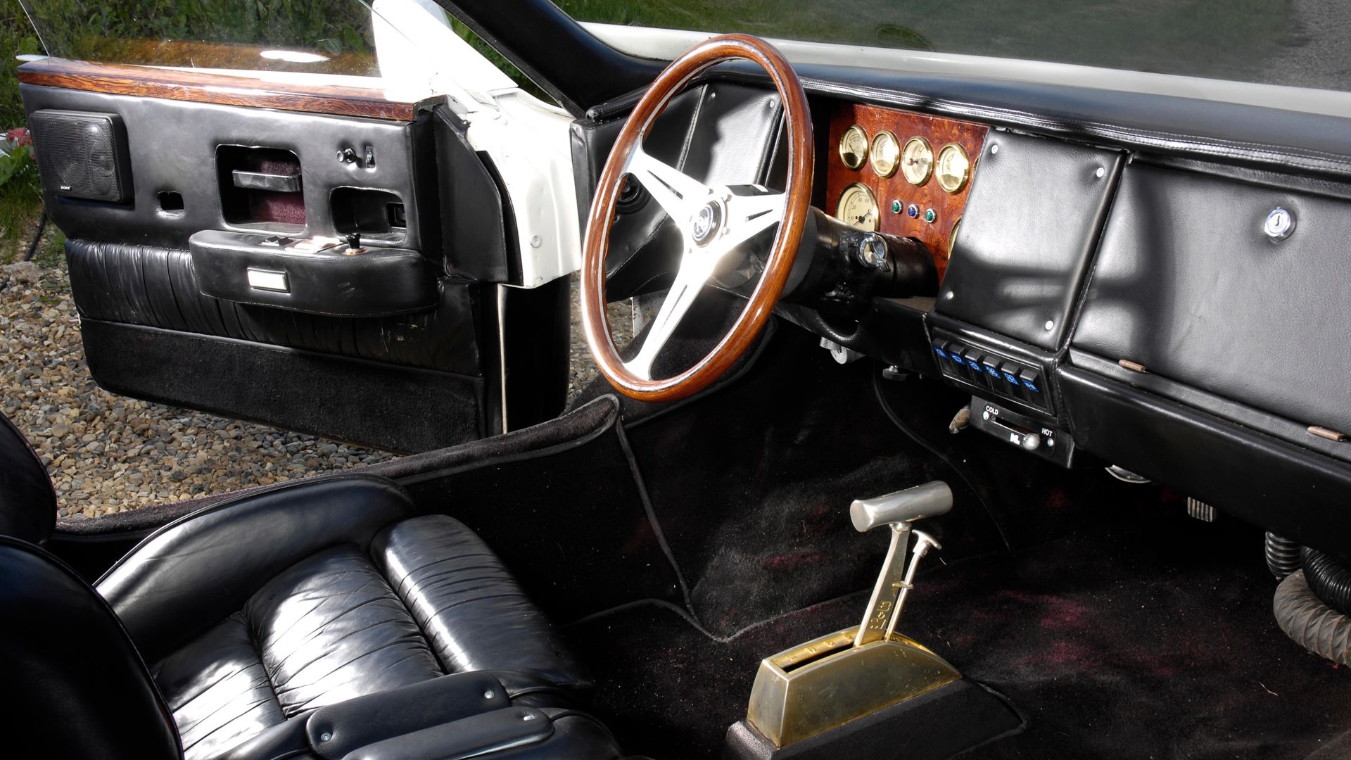 This Forgotten Supercar Had 6 Wheels And Cadillac's Biggest V8 Ever