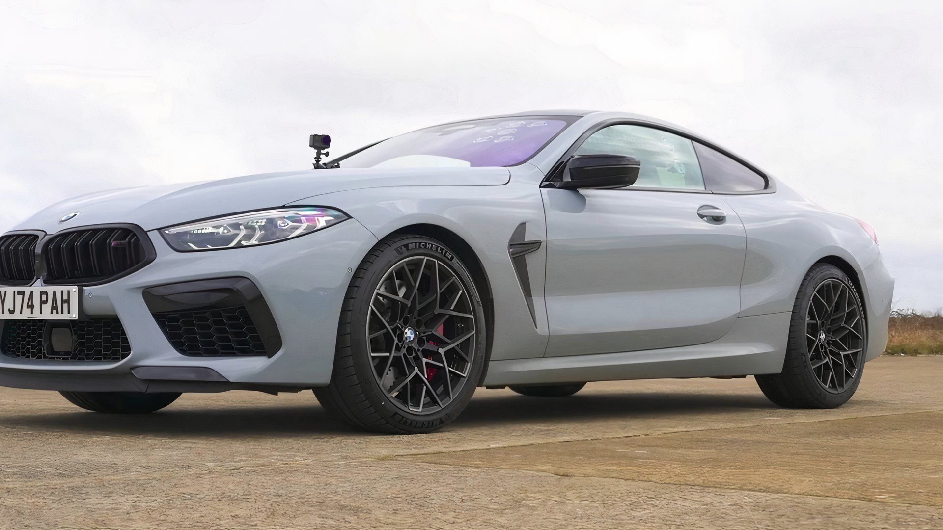 Porsche 911 Carrera GTS Races A BMW M8 Competition