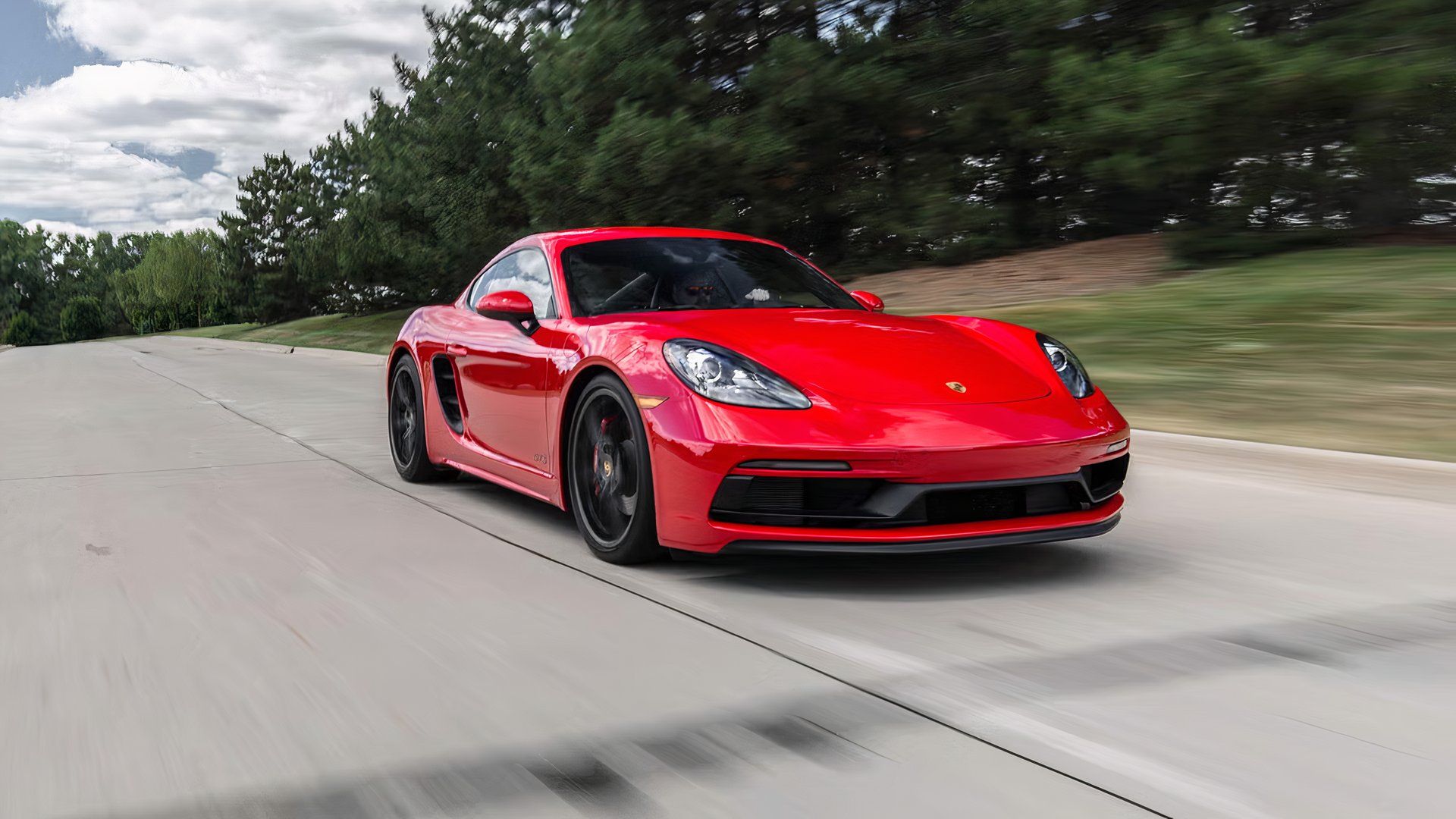 2019 Porsche 718 Cayman S rolling front 3/4 shot