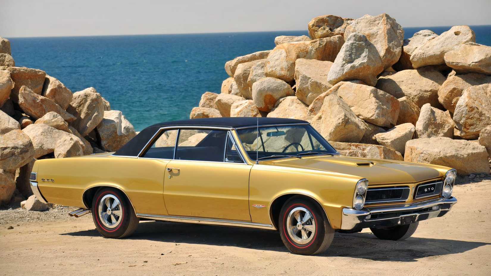 1965 Tiger Gold Pontiac GTO front three quarter pic