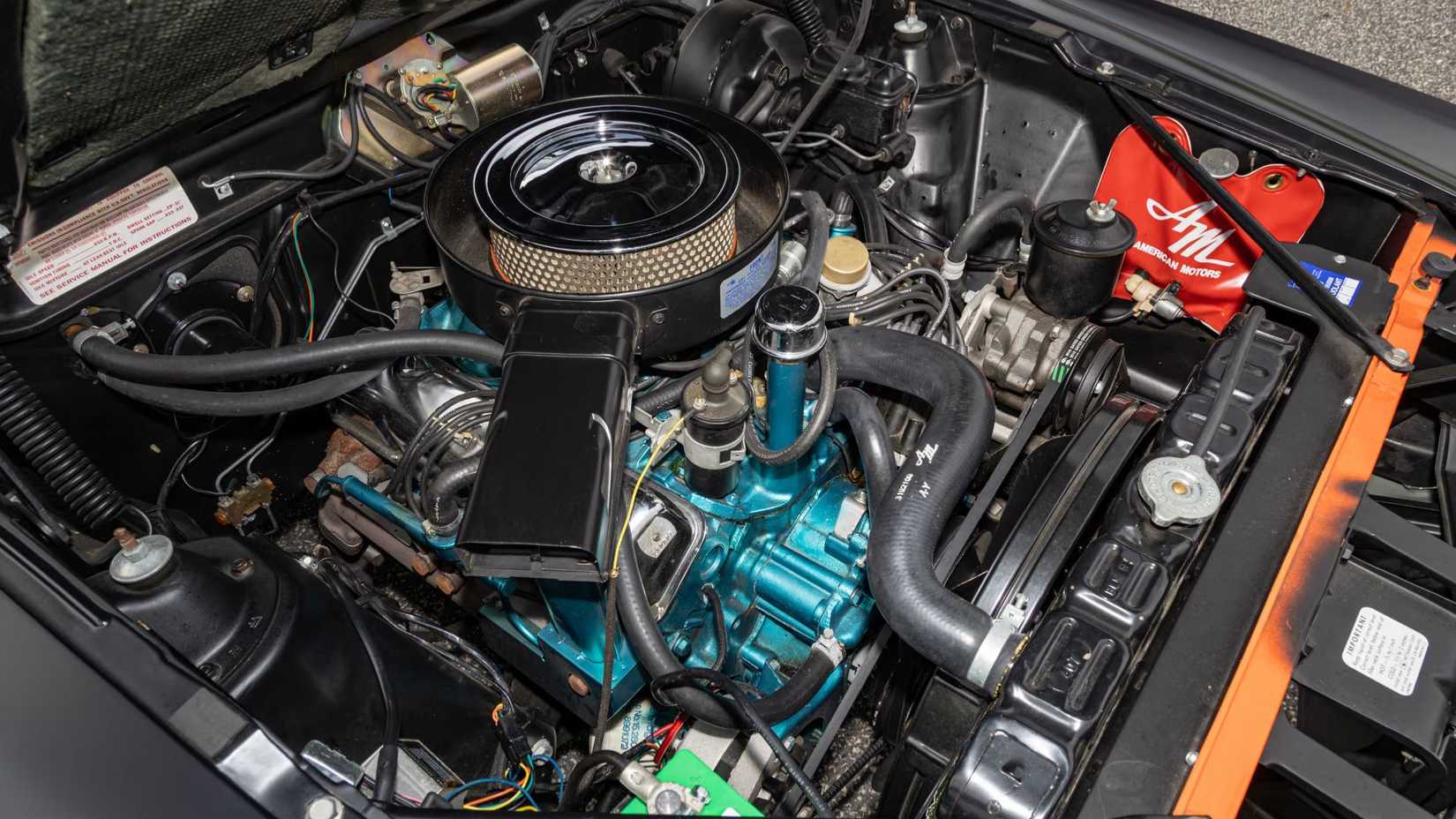 Underhood shot of a 1970 AMC AMX with 390 CI V8 in frame