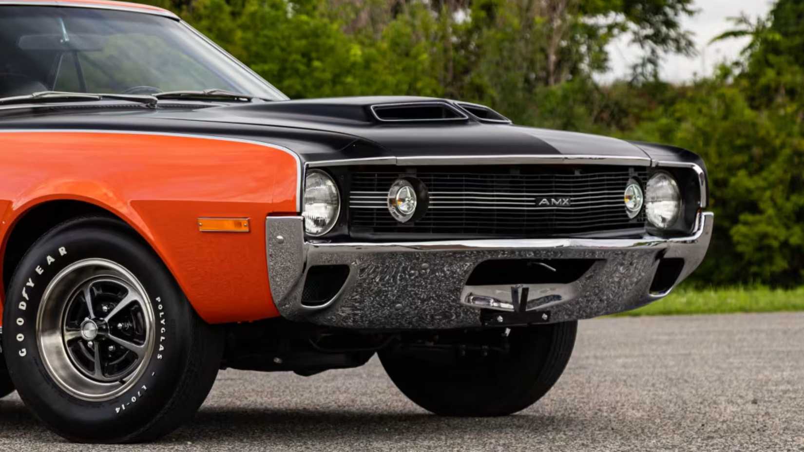 Front end close-up shot of a 1970 AMC AMX finished in Big Bad Orange