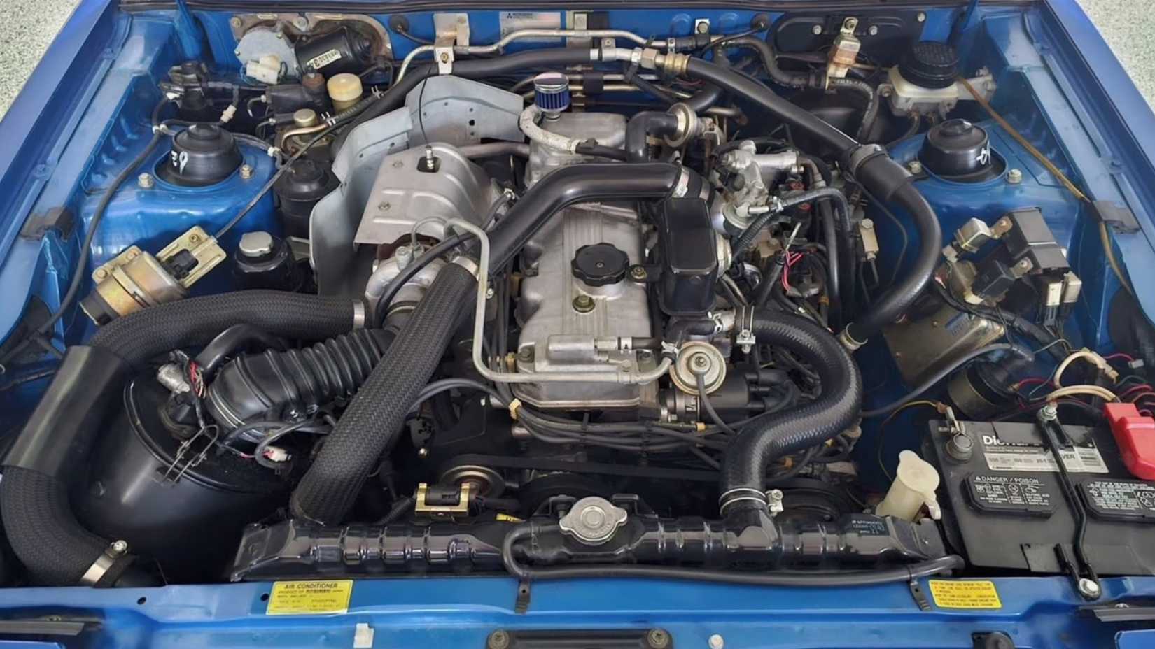 The Japanese-Built Coupe That Wore A Pentastar Badge And Changed Everything