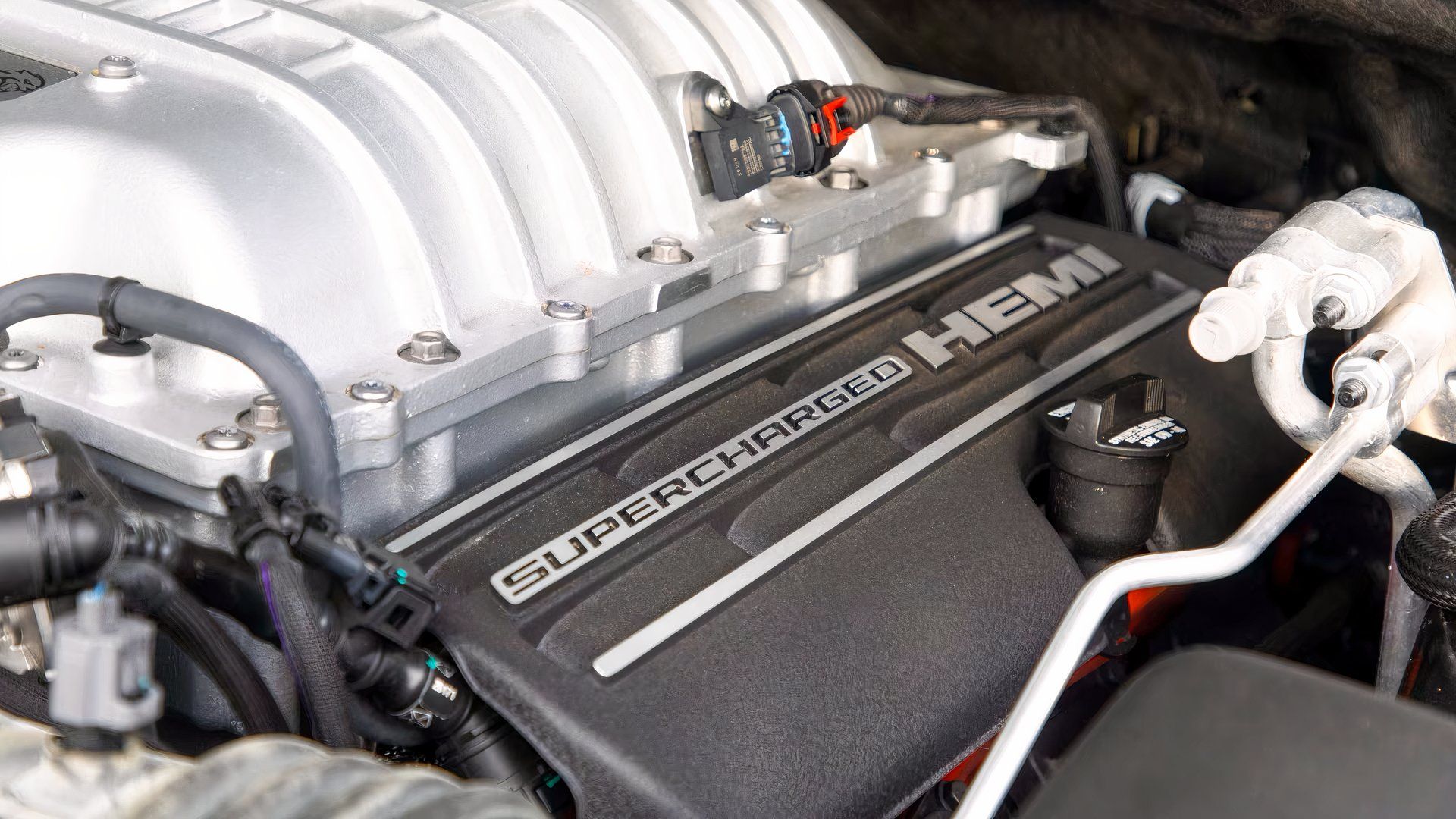This Detroit-Built SUV Outruns Porsches for Half the Price
