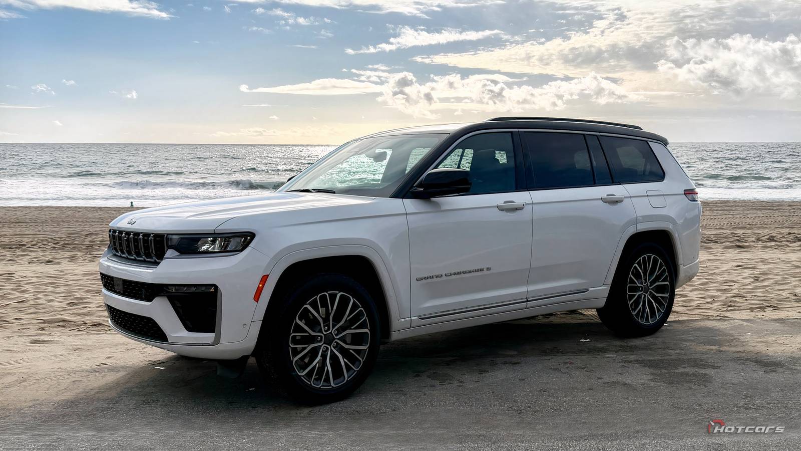 Jeep Grand Cherokee driving along a California coastal highway